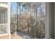 Screened-in view of trees and a sidewalk gives a serene neighborhood at 1413 Basildon Rd, Mount Pleasant, SC 29466