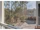 Screened-in view of trees and apartment buildings gives a tranquil living setting at 1413 Basildon Rd, Mount Pleasant, SC 29466