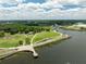 Scenic aerial view of the park with a pier, green spaces, walking paths, and waterfront access at 1423 Bexley St, North Charleston, SC 29405