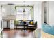 Eat-in kitchen featuring modern appliances, decorative hanging plants, and natural light at 1423 Bexley St, North Charleston, SC 29405