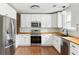 Modern kitchen with white cabinets, stainless steel appliances, and stylish butcher block countertops at 1423 Bexley St, North Charleston, SC 29405