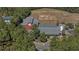 Aerial view of building featuring a ballfield, trees, and parking area at 155 Village Ponds Dr, Summerville, SC 29483