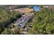 Aerial view of homes surrounded by lush trees, providing a serene and private setting at 155 Village Ponds Dr, Summerville, SC 29483