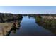 Scenic view of a serene lake surrounded by lush trees at 155 Village Ponds Dr, Summerville, SC 29483