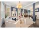 Bright, open living room with comfortable seating, stylish decor, and an inviting atmosphere at 155 Village Ponds Dr, Summerville, SC 29483