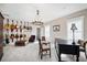 Charming office features unique lighting, neutral walls, and an impressive guitar collection at 155 Village Ponds Dr, Summerville, SC 29483
