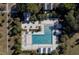 Aerial view of a pool area with ample seating and a sundeck at 155 Village Ponds Dr, Summerville, SC 29483