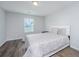 Bright bedroom with hardwood floors, neutral paint, and a large window for natural light at 164 Buchanan Cir, Goose Creek, SC 29445