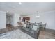 Spacious living room with hardwood floors that flows into the kitchen and dining area at 164 Buchanan Cir, Goose Creek, SC 29445