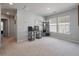 Large bonus room with neutral carpet, multiple windows, and ample space for various uses at 176 Daniels Creek Cir, Goose Creek, SC 29445