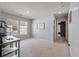 Versatile bonus room with two large windows providing plenty of natural light at 176 Daniels Creek Cir, Goose Creek, SC 29445