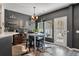 Cozy dining area with decorative shelves and a square table with seating at 176 Daniels Creek Cir, Goose Creek, SC 29445