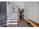Inviting foyer with hardwood floors, a staircase, and stylish decor for a welcoming entrance at 176 Daniels Creek Cir, Goose Creek, SC 29445
