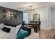 Stylish living room and dining area featuring modern decor and an open layout at 176 Daniels Creek Cir, Goose Creek, SC 29445