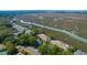 Beautiful aerial view of waterfront homes lining tidal river and salt marsh at 1806 Long Bend Dr, Seabrook Island, SC 29455