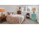 Cozy bedroom with large window, lamps, comfortable decor, and a small accent refrigerator at 1806 Long Bend Dr, Seabrook Island, SC 29455