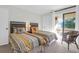 Bedroom features two twin beds, neutral carpeting, and sliding glass doors to a balcony at 1806 Long Bend Dr, Seabrook Island, SC 29455