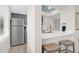 Bright kitchen area featuring stainless steel appliances, marble countertops, and tiled floors at 1806 Long Bend Dr, Seabrook Island, SC 29455