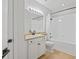 Well-lit bathroom featuring a tub/shower combo with white tile surround and sleek black fixtures at 200 Bucksley Ln # 105, Charleston, SC 29492