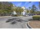 Attractive building exterior showing parking lot, tasteful landscaping, and inviting architectural details at 200 Bucksley Ln # 105, Charleston, SC 29492