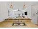 Kitchen sink with a view to the living room at 200 Bucksley Ln # 105, Charleston, SC 29492