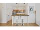 Well-lit kitchen featuring stainless steel appliances and bar seating at 200 Bucksley Ln # 105, Charleston, SC 29492