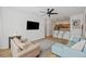 Open concept living room with a view of the kitchen and bar seating at 200 Bucksley Ln # 105, Charleston, SC 29492