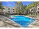 Refreshing outdoor pool with brick surround, ample deck space, and inviting community atmosphere at 200 Bucksley Ln # 105, Charleston, SC 29492