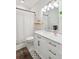 Elegant bathroom with marble countertop, modern vanity, and black and white mosaic tile floor at 2022 Chatelain Way, Mount Pleasant, SC 29464