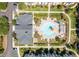 Aerial view of an inviting community pool with lounge chairs and manicured landscaping at 2022 Chatelain Way, Mount Pleasant, SC 29464