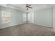 Spacious main bedroom featuring soft paint, carpet floors, and two windows for natural light at 206 Woodbrook Way, Moncks Corner, SC 29461
