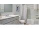 Bathroom featuring vanity with ample counter space, toilet, a shower-tub combo with curtain, and modern fixtures at 2279 Macallan Blvd, Ravenel, SC 29470