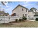 Fenced backyard featuring a patio, outdoor kitchen with built-in grill, and rear exterior of home at 2369 Chadbury Ln, Mount Pleasant, SC 29466