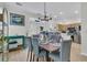 Dining room with a wood table, seating for six, opening to kitchen at 2369 Chadbury Ln, Mount Pleasant, SC 29466