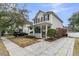 Charming two-story home with a covered front porch, manicured landscaping, and a paved driveway at 2369 Chadbury Ln, Mount Pleasant, SC 29466