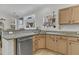 Bright kitchen with stainless steel appliances, wood cabinets and solid surface countertops at 2369 Chadbury Ln, Mount Pleasant, SC 29466