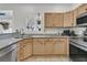 Kitchen featuring stainless steel appliances, wood cabinets and solid surface countertops at 2369 Chadbury Ln, Mount Pleasant, SC 29466