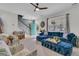 Bright living room with a blue sectional sofa, front door view and stairway at 2369 Chadbury Ln, Mount Pleasant, SC 29466