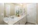 Bright bathroom featuring double sinks, marble countertops, and modern lighting at 263 Stefan Dr, Charleston, SC 29412