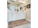Bright bathroom featuring double sinks, marble countertops, and modern lighting at 263 Stefan Dr, Charleston, SC 29412