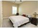 Cozy bedroom featuring a comfortable bed, stylish nightstand, and soft natural light from the window at 263 Stefan Dr, Charleston, SC 29412