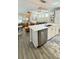 Modern kitchen with stainless steel appliances, a center island, and open to the living area at 263 Stefan Dr, Charleston, SC 29412