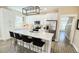 Bright kitchen featuring white cabinets, stainless steel appliances, and a large center island with seating at 263 Stefan Dr, Charleston, SC 29412