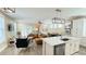 Open-concept living space with a spacious kitchen island and a comfortable seating area at 263 Stefan Dr, Charleston, SC 29412