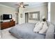 Neutral main bedroom with a plush bed, modern decor, and carpet at 263 Stefan Dr, Charleston, SC 29412