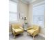 Relaxing sitting area with two cozy chairs and lots of natural light at 263 Stefan Dr, Charleston, SC 29412