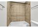 Bathroom featuring a clean white bathtub with shower and tiled walls, creating a refreshing space at 268 Alexandra Dr # 9, Mount Pleasant, SC 29464