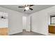 Bedroom featuring neutral carpet, ceiling fan, and an ensuite bathroom at 268 Alexandra Dr # 9, Mount Pleasant, SC 29464