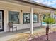 Community gym and exercise area with pool views and covered patio with seating at 268 Alexandra Dr # 9, Mount Pleasant, SC 29464