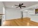 Light-filled living room with hardwood floors, recessed lighting, and a view to kitchen area at 268 Alexandra Dr # 9, Mount Pleasant, SC 29464